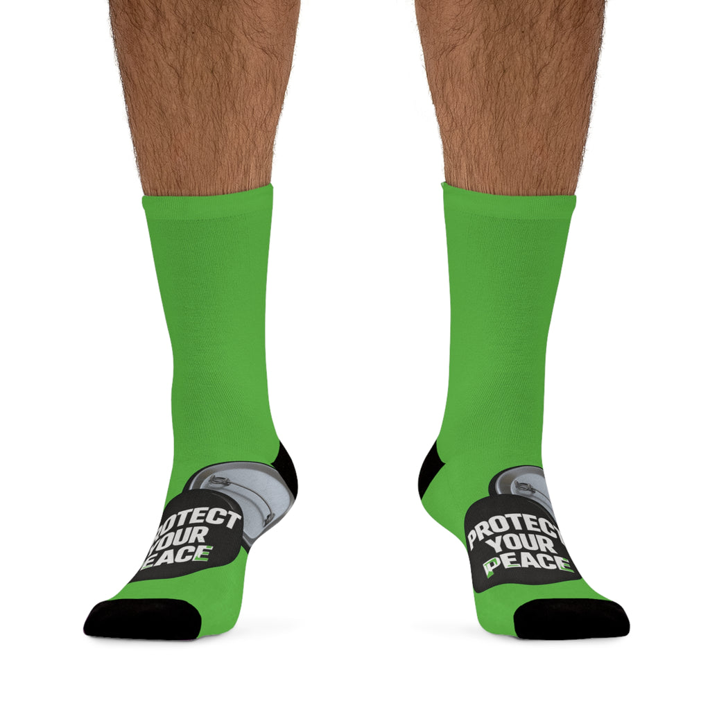 Protect Your Peace Green socks with graphic design .