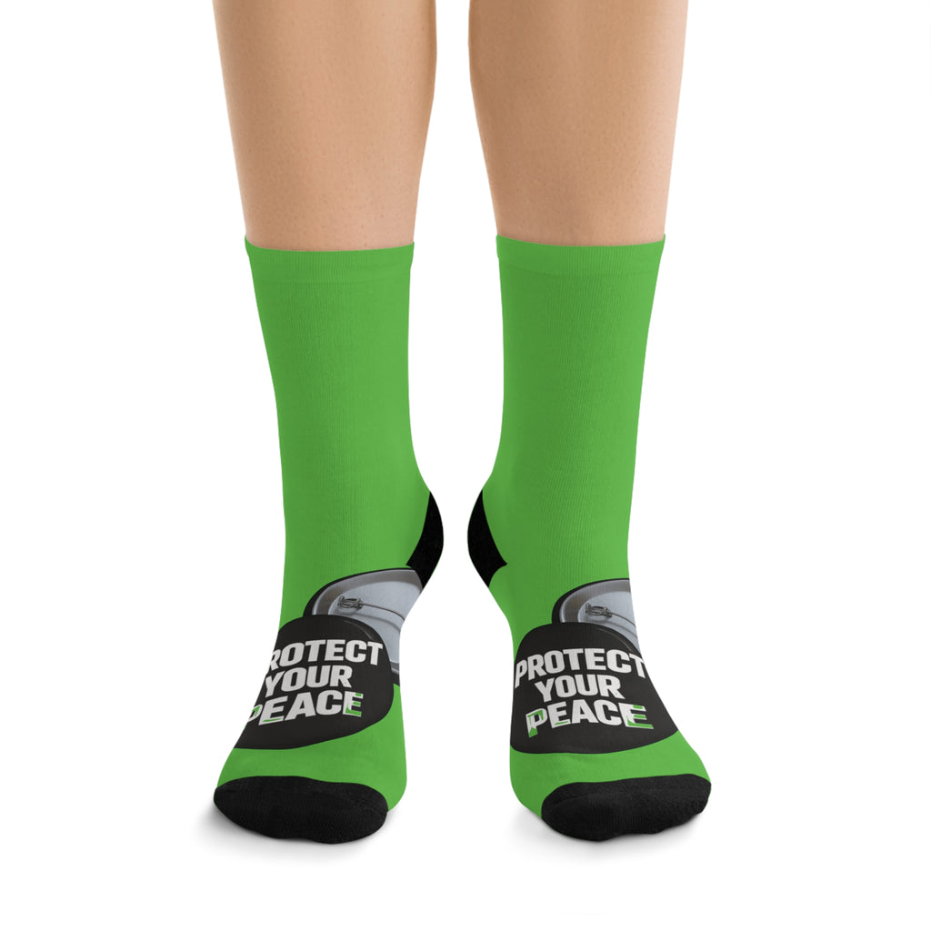 Protect Your Peace Green socks with graphic design .